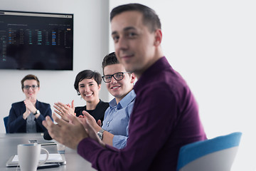 Image showing Group of young people meeting in startup office