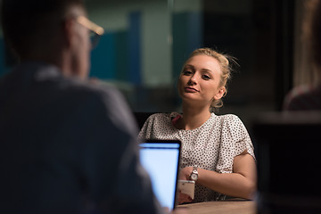 Image showing Multiethnic startup business team in night office