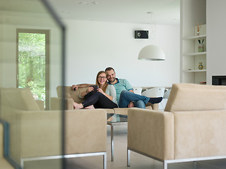 Image showing couple relaxes in the living room