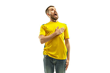 Image showing Brazilian fan celebrating on white background