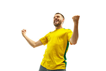 Image showing Brazilian fan celebrating on white background