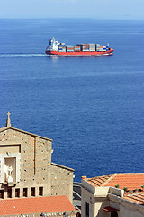 Image showing Cantainer cargo ship over Scilla cathedral