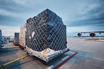 Image showing Loading cargo to airplane