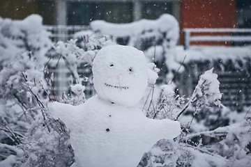 Image showing Big snowman in the city