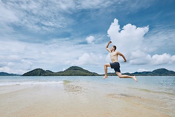 Image showing Jumping to the sea