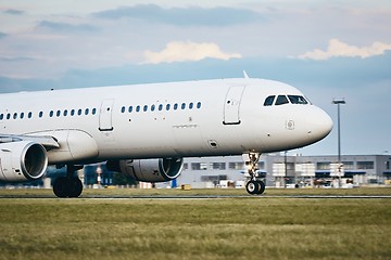 Image showing Airplane landing on the runway