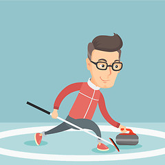 Image showing Sportsman playing curling on on a skating rink.