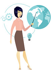 Image showing Asian business woman pointing at a globe.