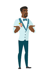 Image showing African confused groom shrugging shoulders.