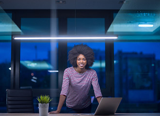 Image showing black businesswoman using a laptop in startup office