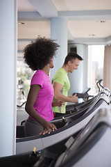 Image showing people exercisinng a cardio on treadmill in gym