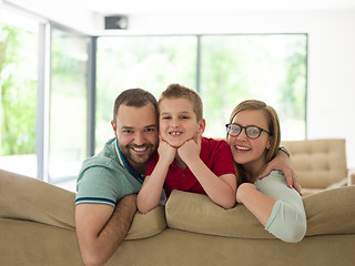 Image showing family with little boy enjoys in the modern living room