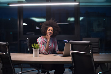 Image showing black businesswoman using a laptop in startup office