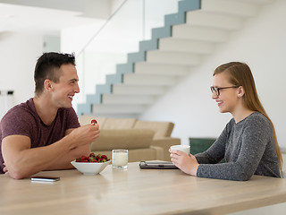 Image showing couple enjoying morning coffee and strawberries