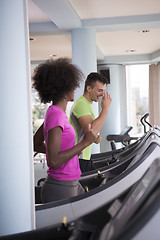 Image showing people exercisinng a cardio on treadmill in gym