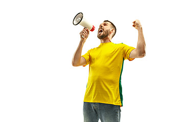 Image showing Brazilian fan celebrating on white background