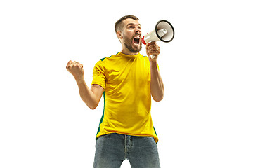 Image showing Brazilian fan celebrating on white background