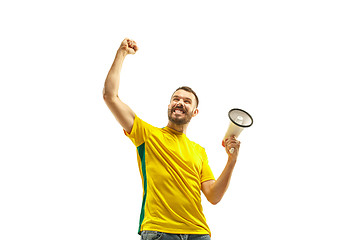 Image showing Brazilian fan celebrating on white background