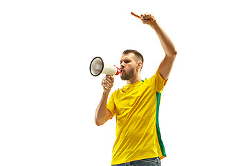 Image showing Brazilian fan celebrating on white background