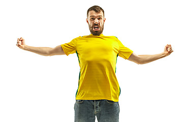 Image showing Brazilian fan celebrating on white background