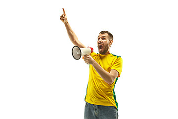 Image showing Brazilian fan celebrating on white background