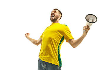 Image showing Brazilian fan celebrating on white background