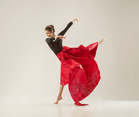 Image showing Modern ballet dancer dancing in full body on white studio background.