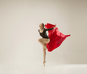 Image showing Modern ballet dancer dancing in full body on white studio background.