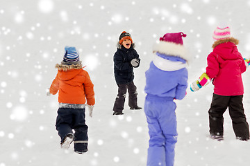 Image showing happy little kids playing outdoors in winter