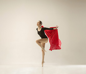 Image showing Modern ballet dancer dancing in full body on white studio background.