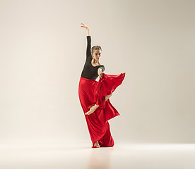 Image showing Modern ballet dancer dancing in full body on white studio background.