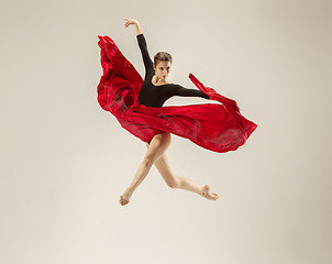 Image showing Modern ballet dancer dancing in full body on white studio background.