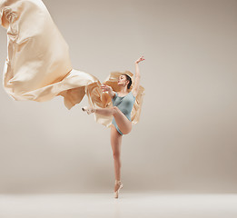 Image showing Modern ballet dancer dancing in full body on white studio background.