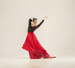 Image showing Modern ballet dancer dancing in full body on white studio background.