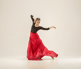 Image showing Modern ballet dancer dancing in full body on white studio background.