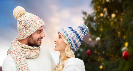 Image showing happy couple over christmas tree