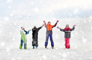 Image showing happy little kids playing outdoors in winter