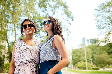 Image showing portrait of happy women or friends at summer park