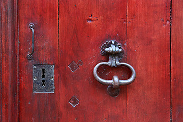 Image showing Vintage door with metallic decorative knocker, handle and keyhol