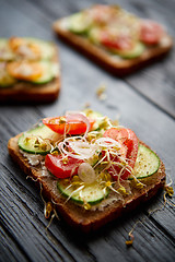 Image showing Healthy vege toasts with onion, cucomber, cherry tomatoes