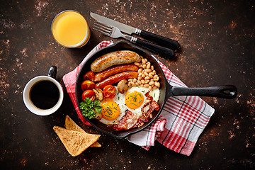 Image showing Delicious english breakfast in iron cooking pan