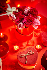 Image showing Valentines day romantic decoration with roses, boxed gifts, candles