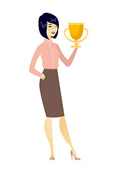 Image showing Asian business woman holding a trophy.