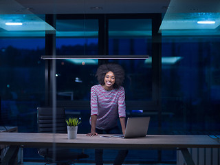 Image showing black businesswoman using a laptop in startup office