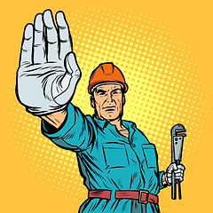 Image showing plumber gesture stop