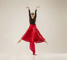 Image showing Modern ballet dancer dancing in full body on white studio background.