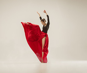 Image showing Modern ballet dancer dancing in full body on white studio background.