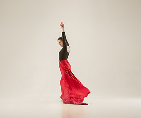 Image showing Modern ballet dancer dancing in full body on white studio background.