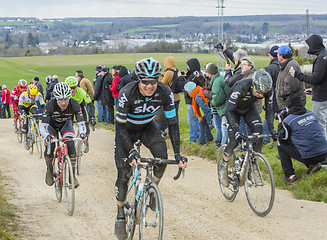 Image showing The Peloton on a Dirty Road - Paris-Nice 2016