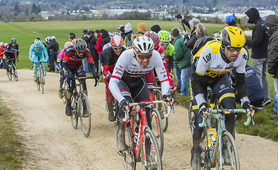 Image showing The Peloton on a Dirty Road - Paris-Nice 2016